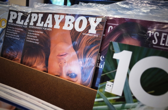 November 2015 issues of Playboy magazine are seen on the shelf of a bookstore in Bethesda, Maryland on October 13, 2015. Playboy said Tuesday it will stop publishing nude photos in its iconic magazine for men, throwing in the towel in the face of rampant online pornography. AFP PHOTO/MANDEL NGAN        (Photo credit should read MANDEL NGAN/AFP/Getty Images)