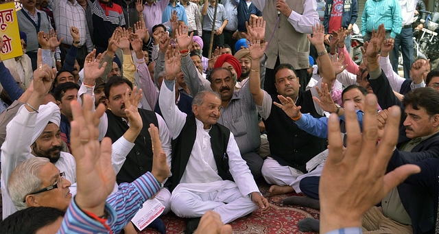 

Indian jewellers shout slogans during a protest against excise duties on gold in Amritsar on March 3, 2016, during a three-day nationwide strike by gold vendors. Jewellers across gold-loving India are on a three-day strike in a bid to force the government to shelve plans for a controversial excise tax announced in this week’s budget / AFP / NARINDER NANU (Photo credit: NARINDER NANU/AFP/Getty Images)