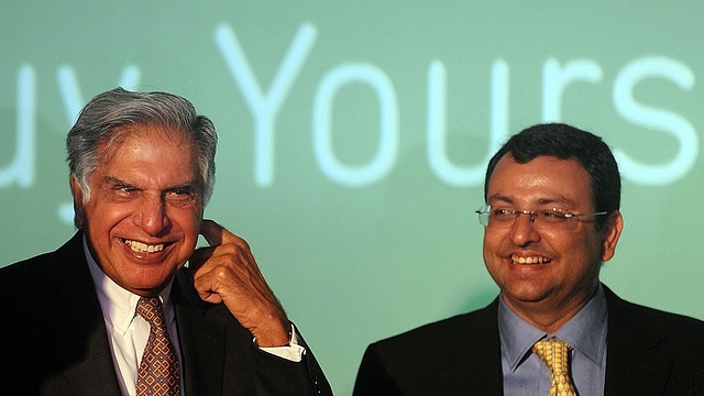 

Tata Sons chairman, Ratan Tata (L) interacts with deputy chairman of Tata Sons, Cyrus Mistry during a function to launch the new Croma e-retail store, in Mumbai on April 23, 2012. India’s leading Tata conglomerate group on April 23 announced the online foray of its consumer electronics retail stores Croma, in the presence of the group’s successor-in-waiting Cyrus Mistry. AFP PHOTO/Punit PARANJPE (Photo credit: PUNIT PARANJPE/AFP/Getty Images)