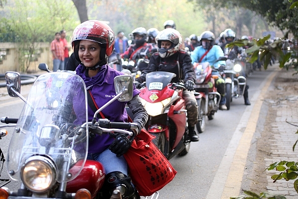 A girl riding a bike