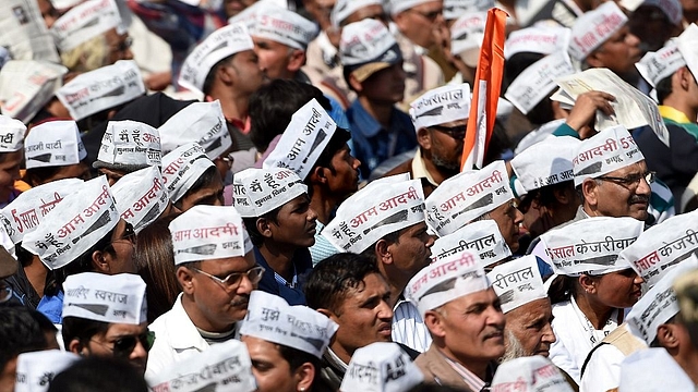 Aam Aadmi Party members (SAJJAD HUSSAIN/AFP/Getty Images))