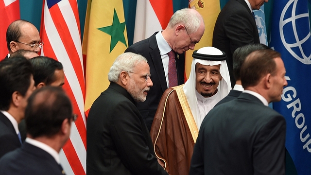 

Saudi Arabia’s Crown Prince Salman bin Abdulaziz (2nd R) shakes hands with India’s Prime Minister Narendra Modi (C) after they joined heads of states and international organizations for a ‘family photo’ during the G20 Summit in Brisbane on November 15, 2014. Australia is hosting the leaders of the world’s 20 biggest economies for the G20 summit in Brisbane on November 15 and 16. AFP PHOTO / Saeed KHAN (Photo credit: SAEED KHAN/AFP/Getty Images)