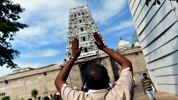 Devotees at a temple/Getty Images