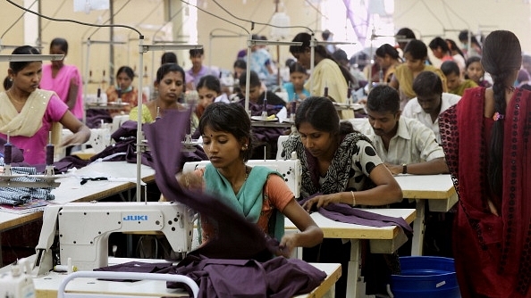 Workers at a garment factory.  (Manjunath Kiran/AFP/Getty Images)