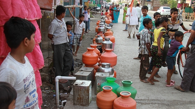 

Water queue at Sai Road in Aravi village, Latur, on 15 April, 2015. Photo by Vivian Fernandes