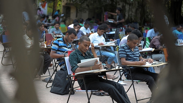 India students examination (NOAH SEELAM/AFP/Getty Images)