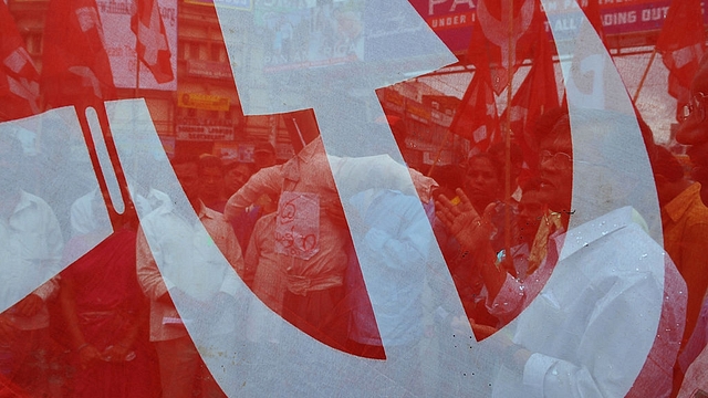 Communist flag (NOAH SEELAM/AFP/Getty Images)