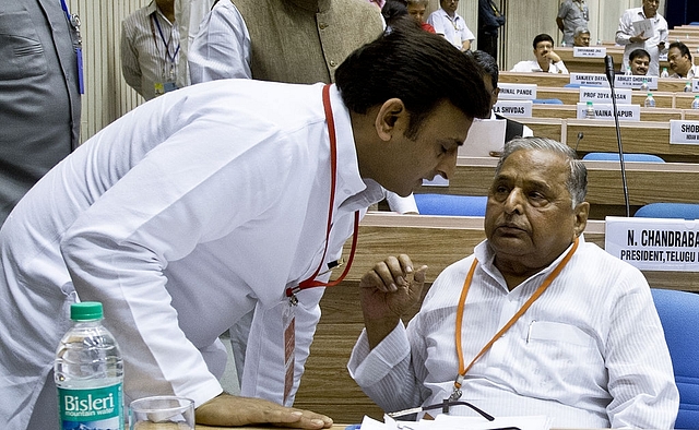 Akhilesh Yadav and Mulayam Singh Yadav (PRAKASH SINGH/AFP/Getty Images)