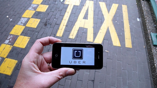 Uber app (NICOLAS MAETERLINCK/AFP/Getty Images)