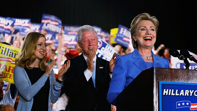 Democratic presidential hopeful U.S. Senator Hillary Clinton (D-NY) speaks as her husband President Bill Clinton and daughter Chelsea Clinton stand behind her at her primary night event in the Egyptian Room of the Murat Centre May 6, 2008, in Indianapolis, Indiana. Sen. Barack Obama, (D-IL) and Senator Hillary Clinton (D-NY) continue the Democrats battle for their parties presidential nomination. (Photo by Joe Raedle/Getty Images)