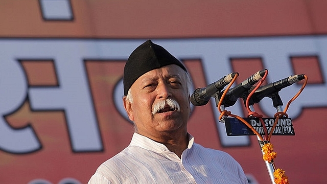 RSS chief Mohan Bhagwat speaks  during a rally. (Getty Images)