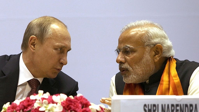 Vladimir Putin (L) and Narendra Modi (FINDLAY KEMBER/AFP/Getty Images)&nbsp;