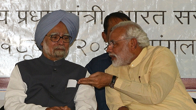 Manmohan Singh and Narendra Modi (SAM PANTHAKY/AFP/Getty Images)&nbsp;