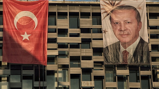 An Erdogan poster in Turkey (Kursat Bayhan/Getty Images)&nbsp;