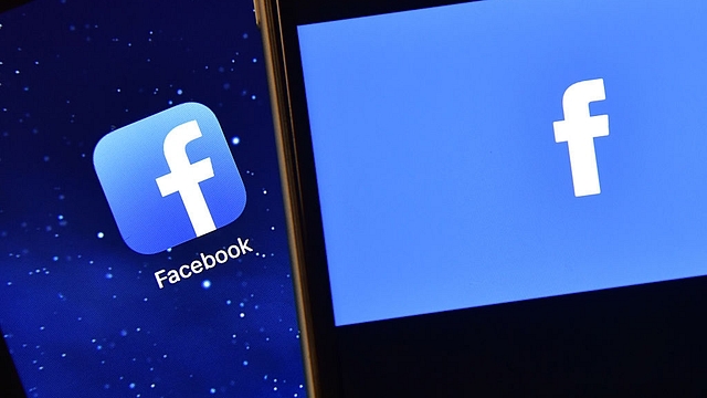 The Facebook app logo is displayed on an iPad next to a picture of the
Facebook logo on an iPhone. Photo credit: 
Carl Court/GettyImages.