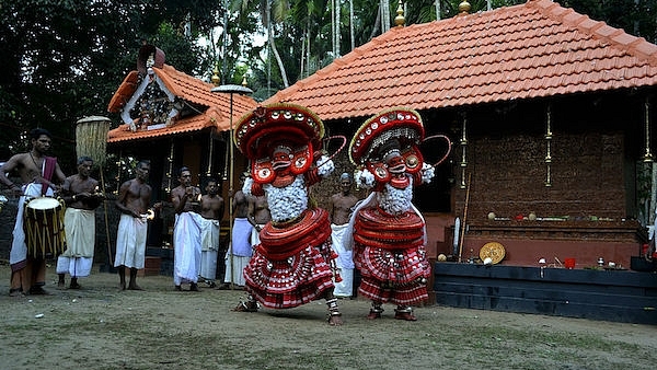 Photo: Teyyam, Kerala (Wikimedia Commons)