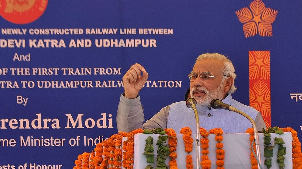 Prime Minister Narendra Modi speaks during the inauguration ceremony at Katra railway station, 45 km from Jammu. Photo credit: STR/AFP/GettyImages