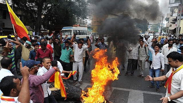 A protest on the Cauvery dispute turns violent in Bangalore (STRINGER/AFP/Getty Images)