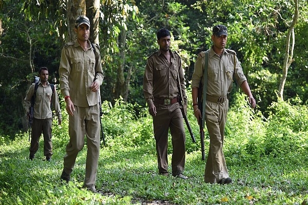 Indian forest rangers patrol in Kaziranga National Park, some 250 km east of Guwahati. (BIJU BORO/AFP/Getty Images)