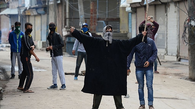 A protest in Kashmir (SAJJAD HUSSAIN/AFP/Getty Images))&nbsp;