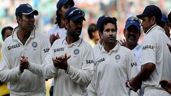 Rahul Dravid (R) being applaud by teammates Sachin Tendulkar (3R), Mahendra Singh Dhoni (2L) and VVS Laxman (L) after Dravid won a ‘man of the match’ award (PUNIT PARANJPE/AFP/Getty Images)