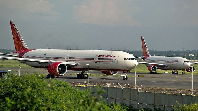 Air India planes prepare for take-off at the Indira
Gandhi International Airport in New Delhi. (MANAN
VATSYAYANA/AFP/GettyImages)