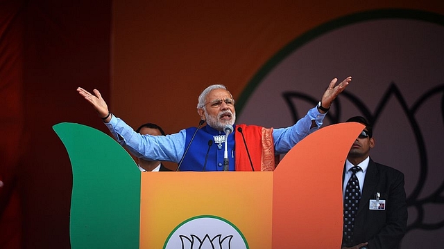 Prime Minister Narendra Modi gestures as he addresses a public rally in New Delhi. (Chandan Khanna/AFP/Getty Images)