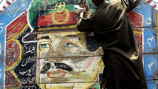 An Ayub Khan illustration on a truck (ARIF ALI/AFP/Getty Images)