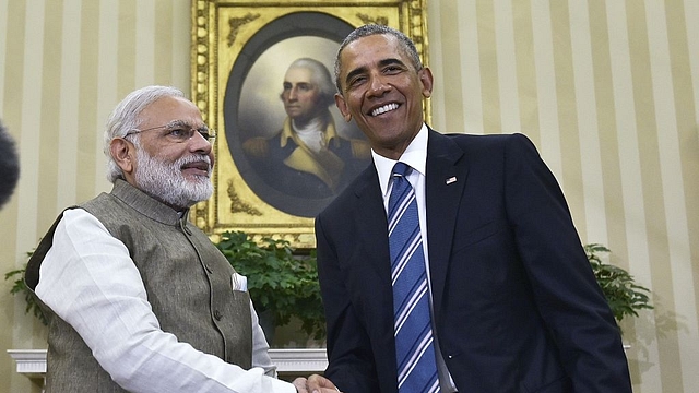 US President Barack Obama shakes hands with Prime Minister Narendra Modi during a meeting in the Oval Office of the White House (MANDEL NGAN/AFP/Getty Images)