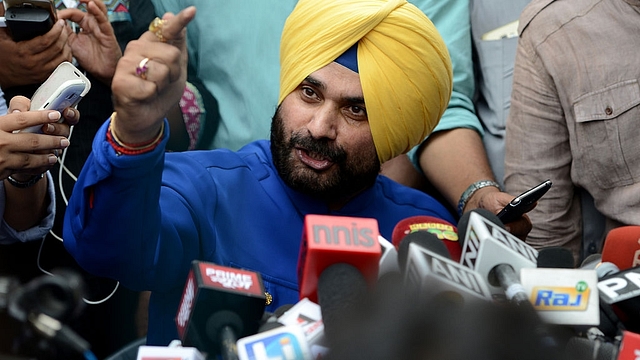 Sidhu addresses the media outside his residence. Photo
credit: MONEY SHARMA/AFP/GettyImages &nbsp; &nbsp; &nbsp;