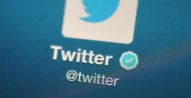 The Twitter logo is displayed on a mobile device. (Bethany Clarke/Getty Images) 