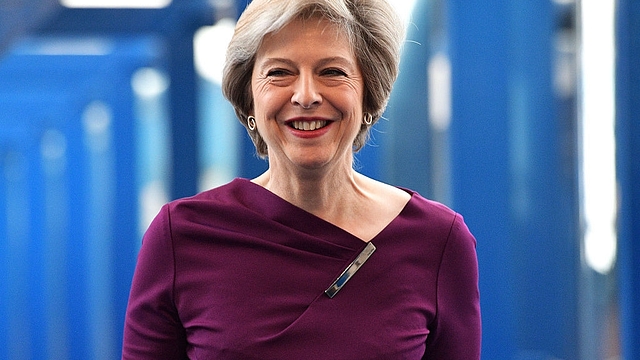 May at the
Conservative Party Conference in Birmingham, England.  Photo credit: 
Carl Court/GettyImages