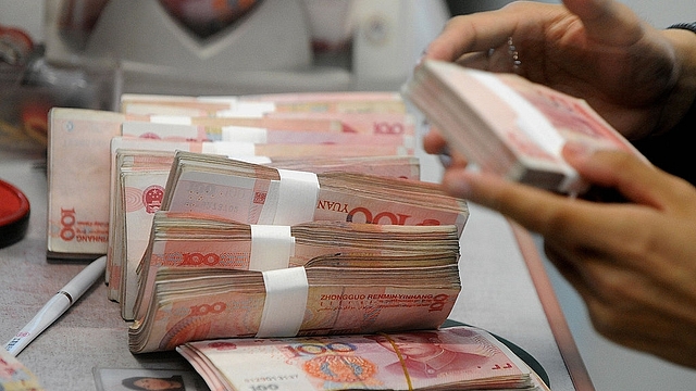 Decelerating growth and rising debt levels have affected the Chinese economy . (MARK
RALSTON/AFP/GettyImages)