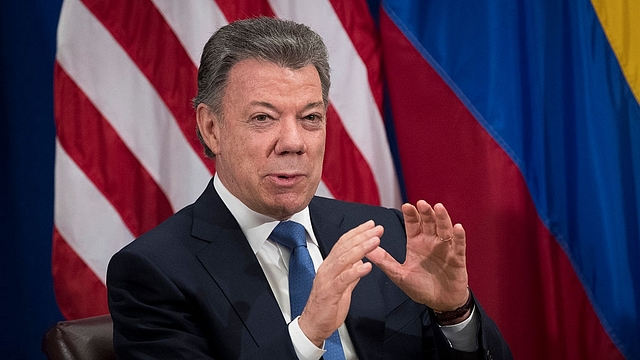 Santos speaks during a meeting in US. Photo credit: Drew
Angerer/GettyImages