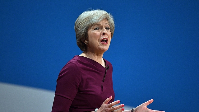 May delivers a speech during the fourth day of the Conservative Party Conference at the ICC Birmingham. Photo credit: Carl Court/GettyImages