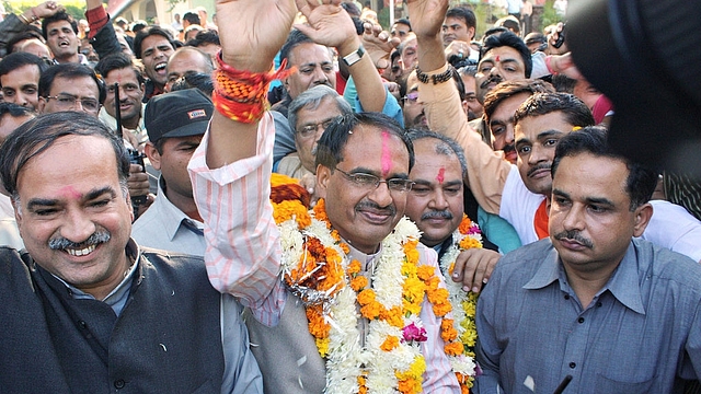 Madhya Pradesh Chief Minister Shivraj Singh Chouhan (C) (STR/AFP/Getty Images)