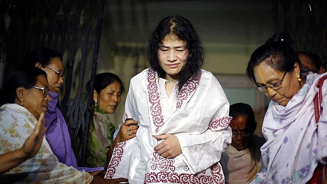 Irom Sharmila with her supporters. (STRDEL/AFP/GettyImages)