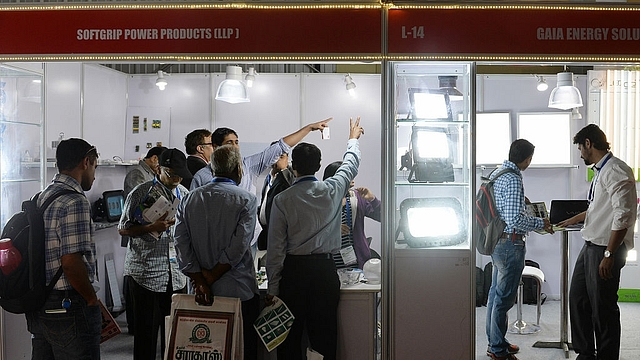 Visitors check out
various LED lighting devices on display at the India Electronics Week
exhibition at the Bangalore International Exhibition Centre. Photo credit:
MANJUNATH KIRAN/AFP/GettyImages