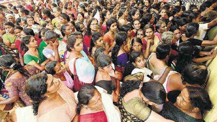 Women wait for their turn to take photograph for the new ration card at a camp in Kottayam. (Photo by <a href="http://english.manoramaonline.com/news/kerala/ration-card-fiasco-kerala-government-mistakes.html">Manorama Online</a>)