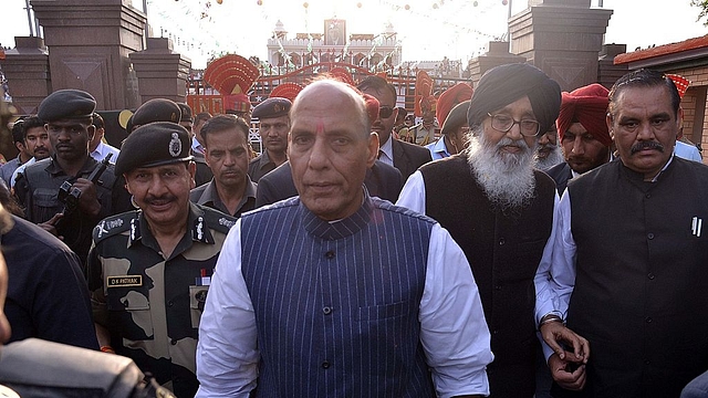 Union Home Minister Rajnath Singh (C), Punjab state chief minister Parkash Singh Badal (2R) and Border Security Force (BSF) Director General DK Pathak (L) (NARINDER NANU/AFP/Getty Images)