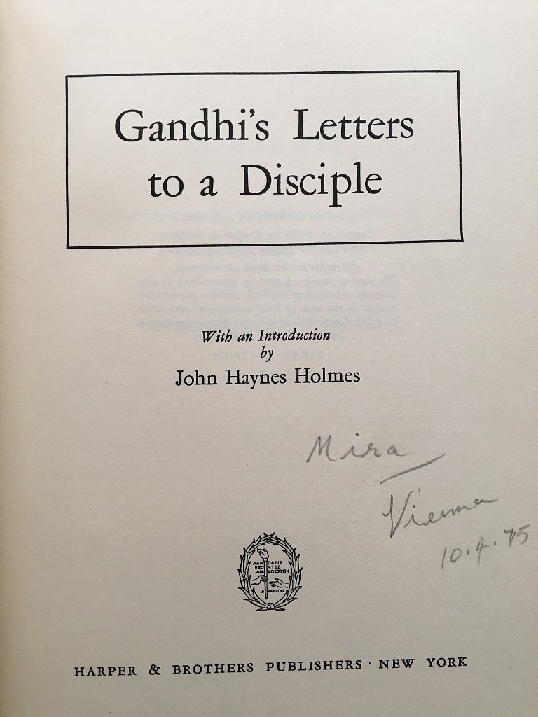 Miraben signs this copy of <i>Gandhi’s Letters to a Disciple</i>