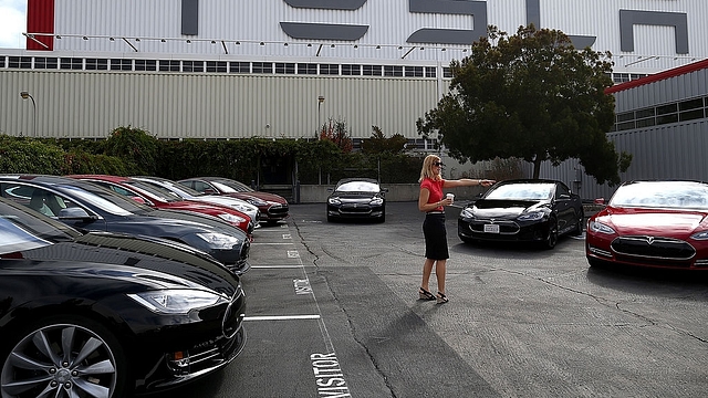 Tesla sedans parked in front of the company’s factory in
Fremont, California. Photo credit: Justin Sullivan/GettyImages