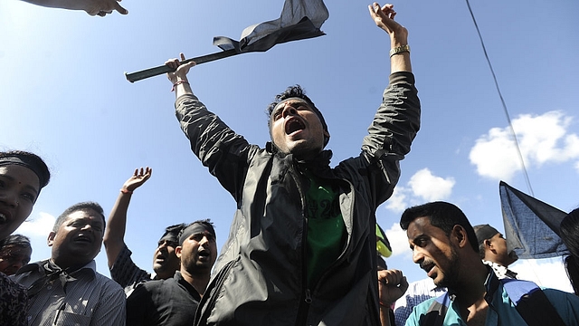 Nepalese activists from the Federal Alliance (members of the Madhesi and ethnic communities) chanting anti-constitution slogans. Photo credit: PRAKASH MATHEMA/AFP/Getty Images