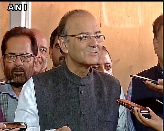 Arun Jaitley talking to the Press outside the Rajya Sabha