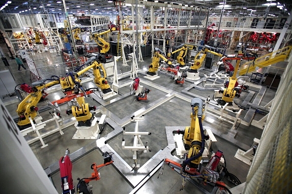 Robots on the assembly line of a car factory