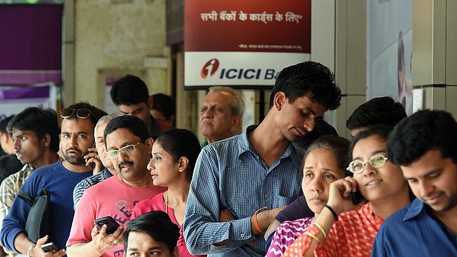 An ATM queue (PUNIT PARANJPE/AFP/Getty Images)