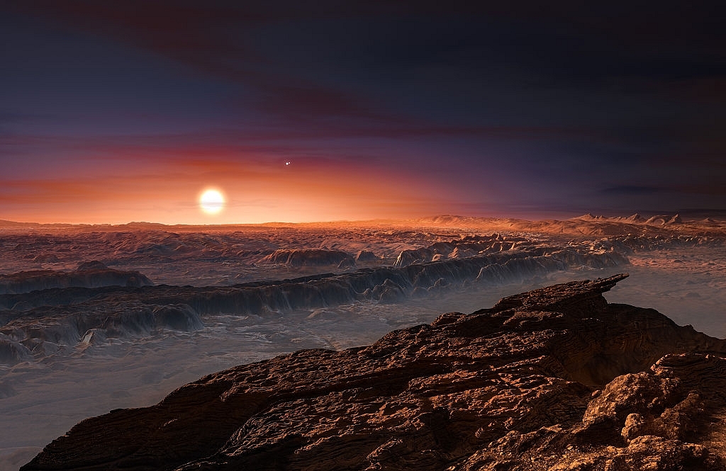 An artist’s impression of a view of the surface of the planet Proxima b orbiting the red dwarf star Proxima Centauri, the closest star to the Solar System. (M. KORNMESSER/AFP/Getty Images)
