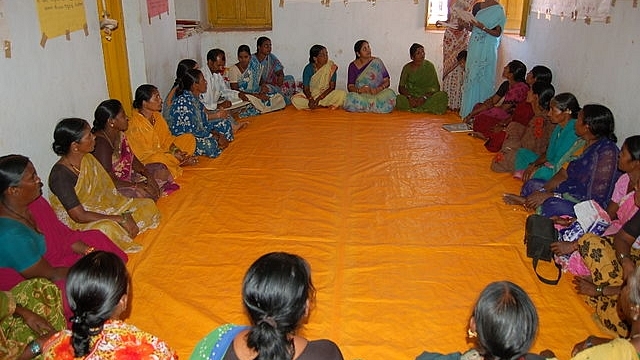 Women from Self-Help Groups take part in a meeting. Photo credit: SERPEditor/Wikimedia Commons