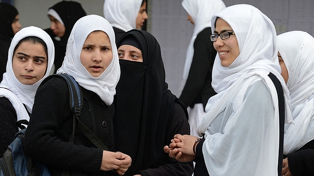 
Kashmiri students gather for exams. Photo credit: TAUSEEF MUSTAFA/AFP/GettyImages