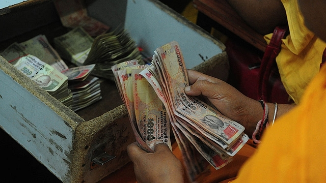 Rs 1000 and Rs 500 notes (SANJAY KANOJIA/AFP/Getty Images)